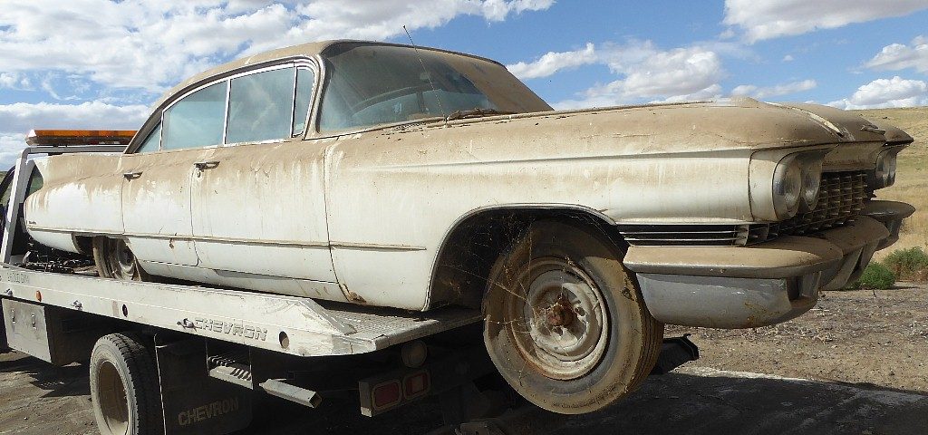 1960 Cadillac  Series 62  4 dr H/T, complete and original, stored in a barn since early eighties, minor rust and old body work. Skirts and hubcaps in trunk. Not running  $3,500 n-516 Sorry, this one is sold!