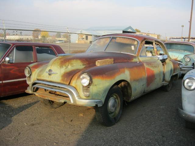 1949 Olds 98 - 4 dr sedan  Complete but partially disassembled. V-8 Automatic nice bumpers and chrome, Great parts car   n-304