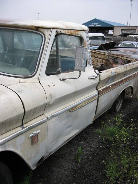 1964 Chevy 1/2 ton Fleetside long bed w/Custom trim  283 Powerglide, beat up and rusty, but  Great parts truck.  n-328
