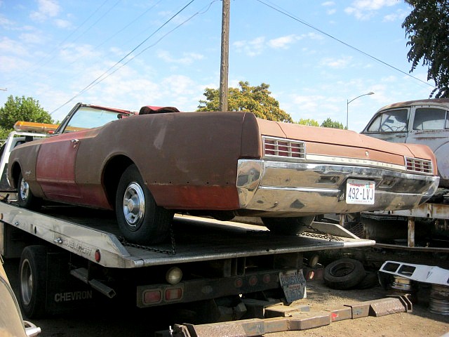 1966 Olds Dynamic 88 convertible  425 V-8 , Power steering and brakes, Power seat, Rare Power door locks, underdash A/C.  Runs good, straight body, very minor rust, nice chrome, Factory build sheet  $4,250  n-392