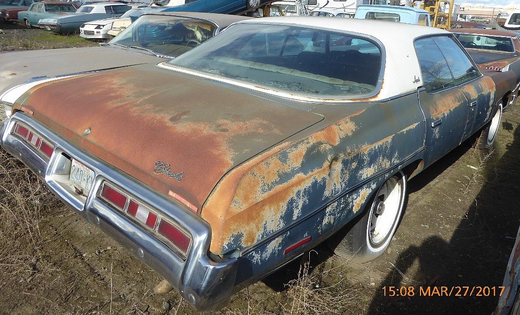 1972 Impala 4 dr hardtop.- Goodwrench 350, straight solid body, black interior Rally wheels. Runs and drives good. $2,500 n-522