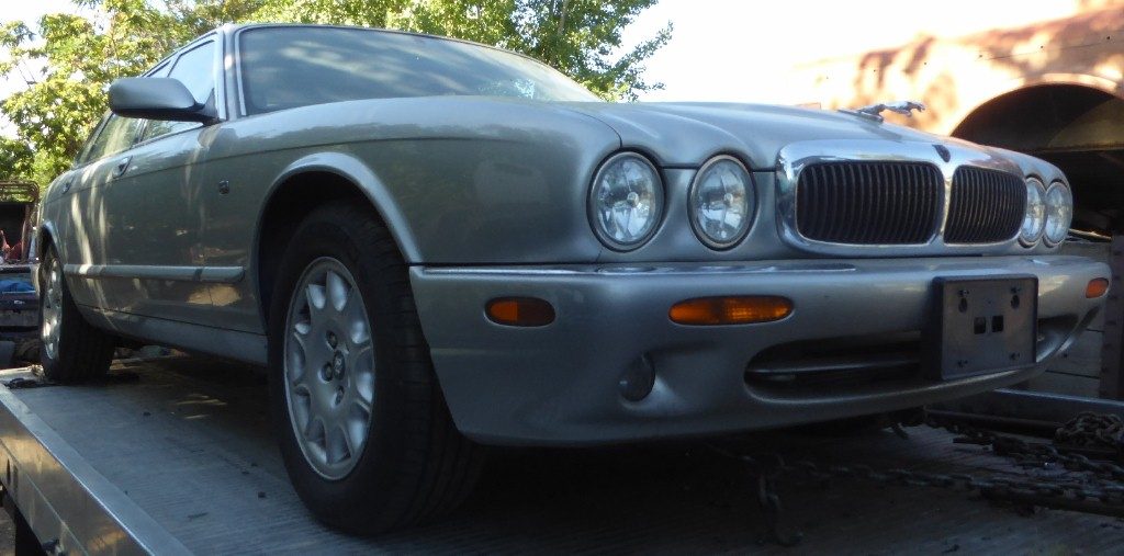 1998 Jaguar XJ 8 sedan  V8 automatic, beautiful condition inside and out . Silver with black leather interior, nice Michelin tires. Has engine problems. $2,150  n-532
