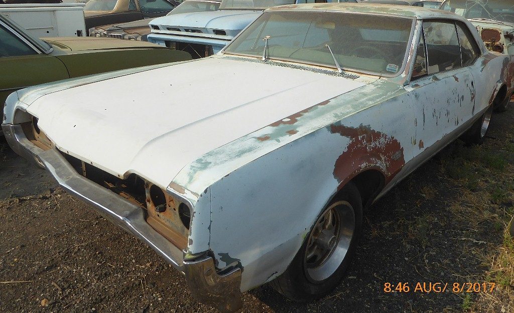 1966 Olds F/85 2 dr H/T  330 V-8, automatic, power steering and brakes, engine disassembled, good straight body 95% complete   $2,250 n-534